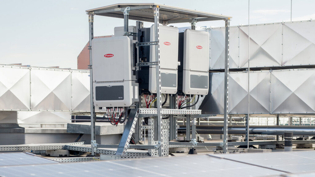 With larger rooftop PV systems, inverters are often situated next to the modules